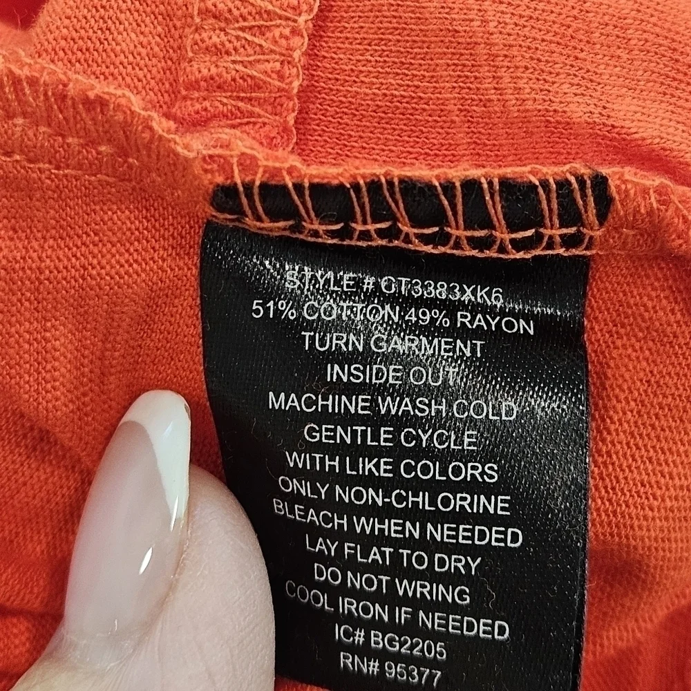 NWT ORANGE TOP SIZE MEDIUM